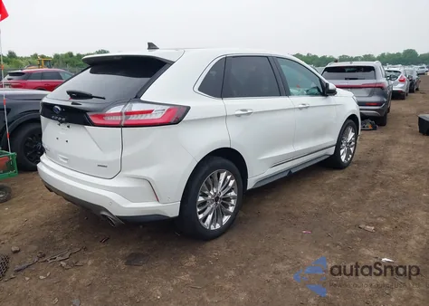 2022 Ford Edge Titanium z USA, uszkodzony, nr VIN 2FMPK4K9XNBA17689